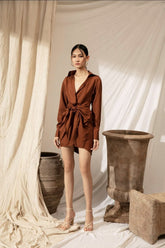 Silk shirt dress with tie-front draping and collared neckline for contemporary elegance